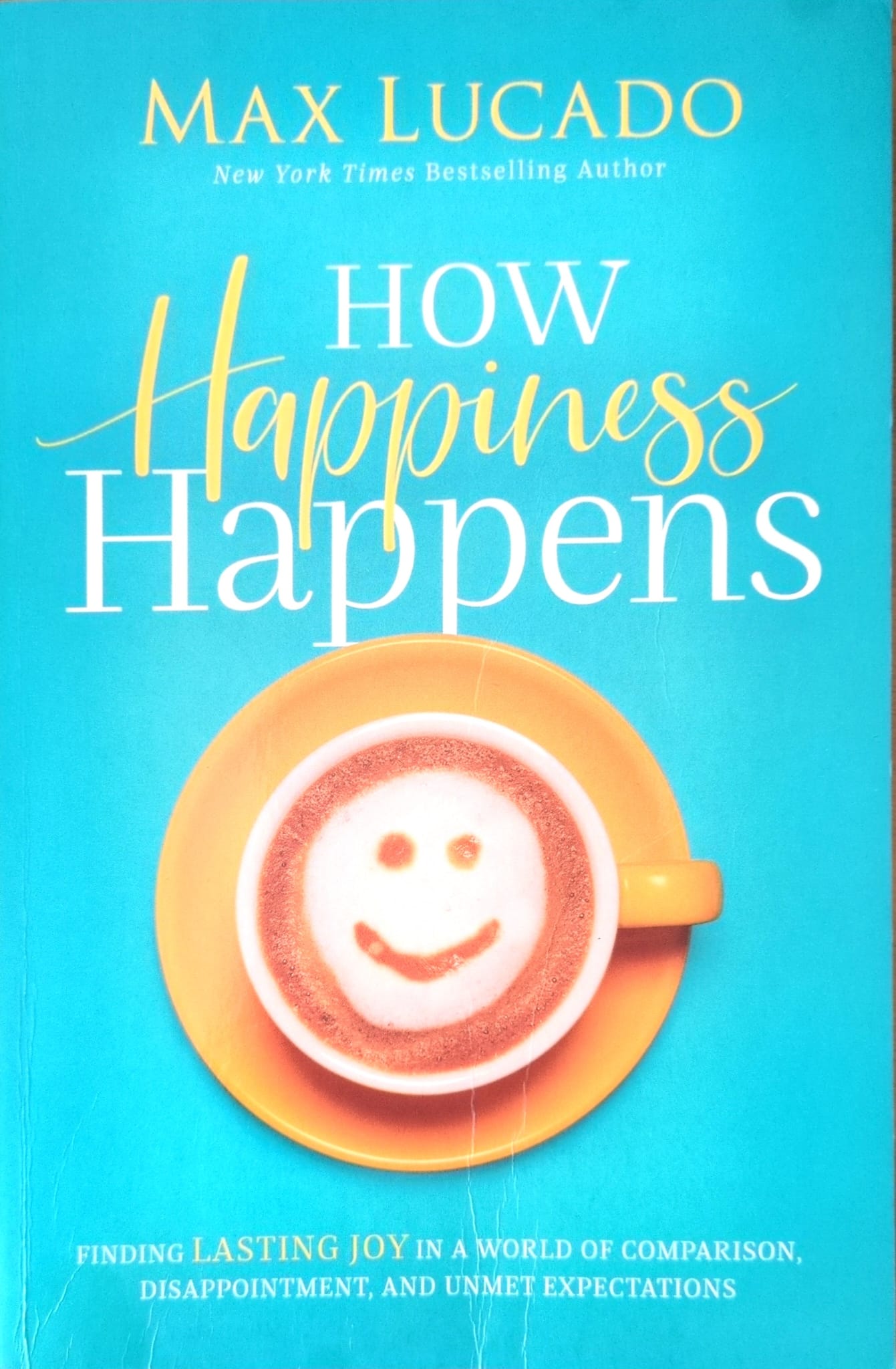 Book cover for "How Happiness Happens" of Max Lucado